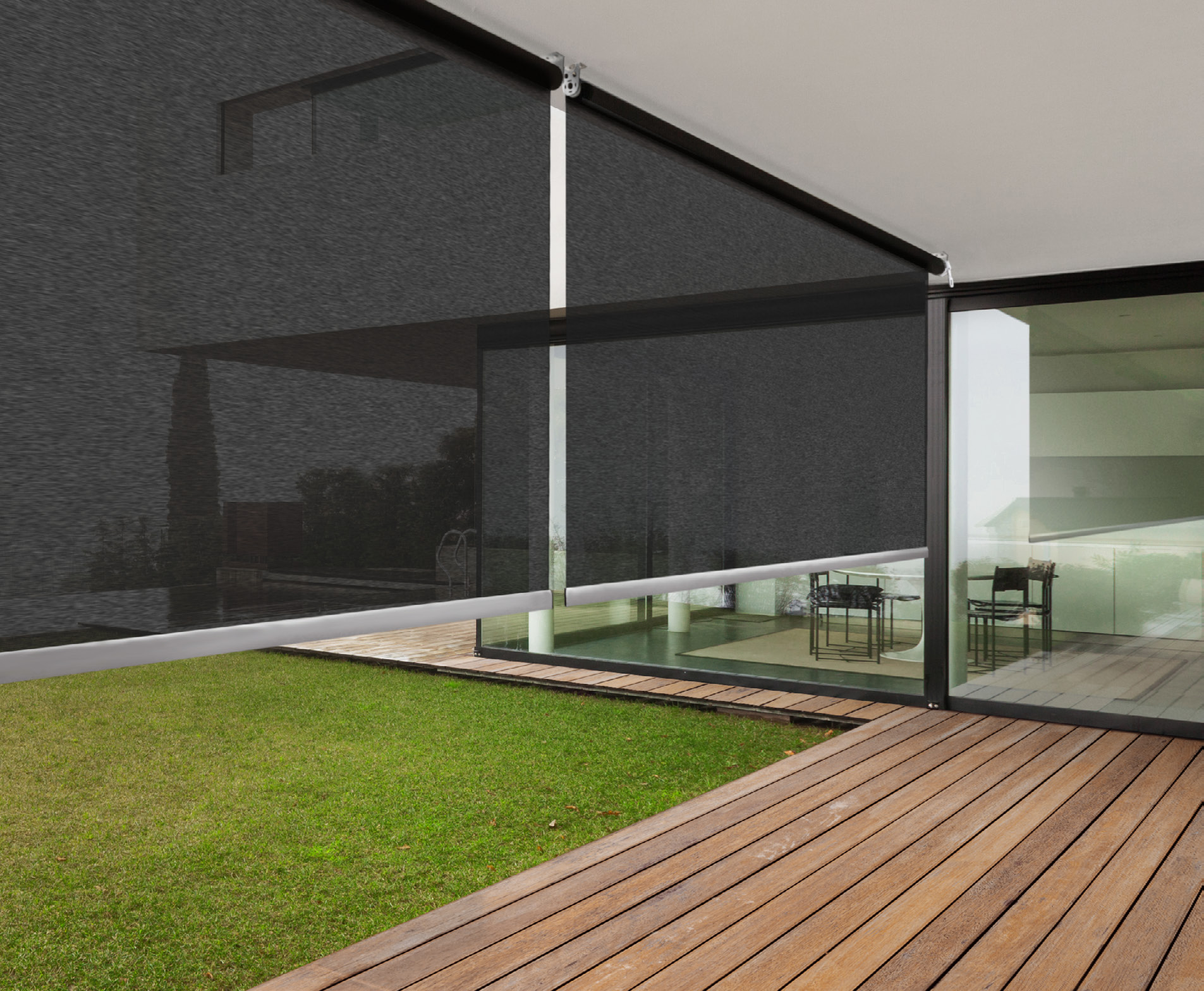 Cocha mesh screens lowered beside a deck and outdoor living area.
